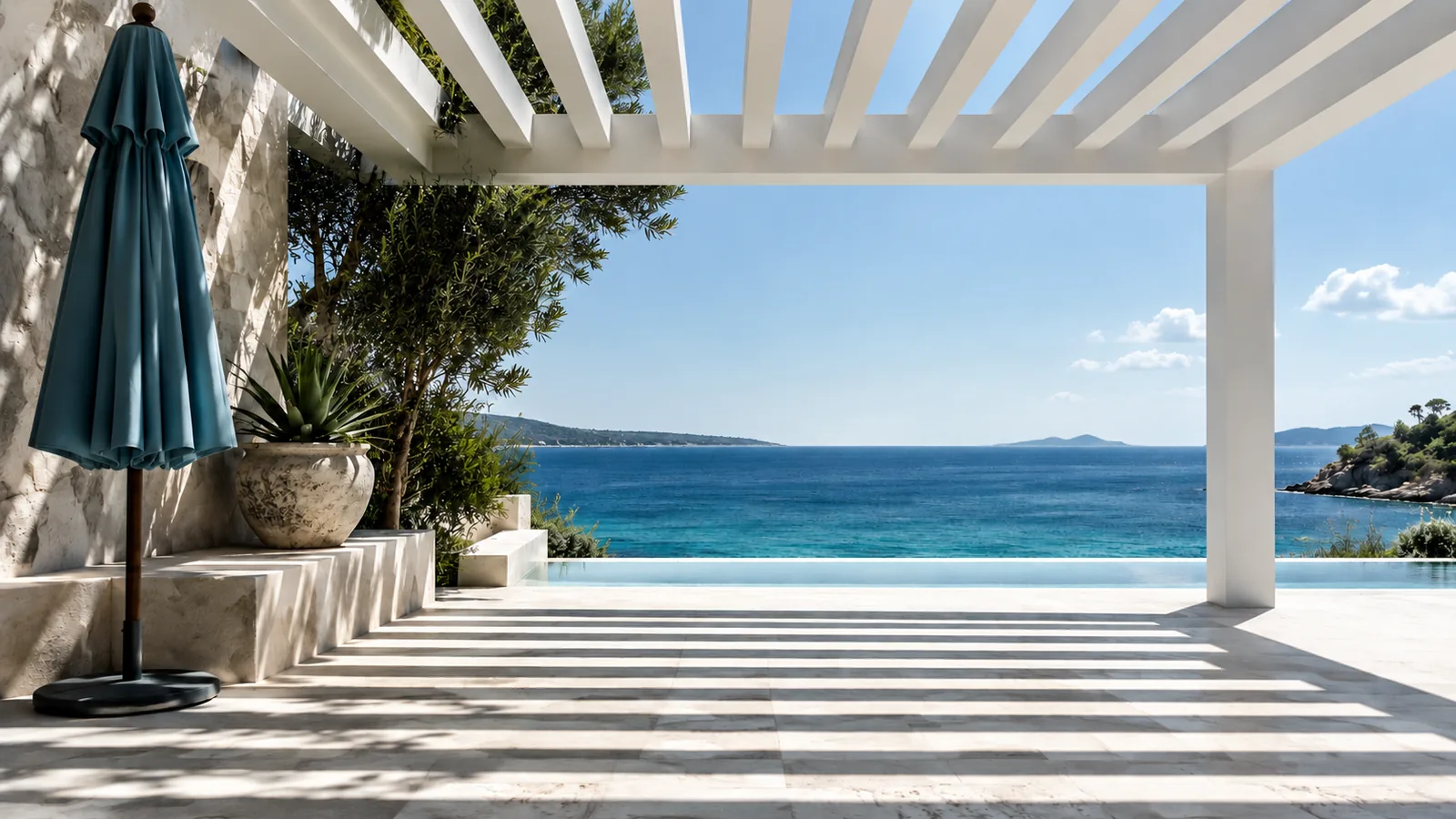 Strong sun and shade bands beneath a white pergola with a closed blue umbrella in the shade